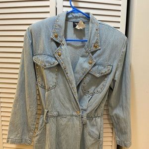 Fun denim dress with embellishments and shoulder pads.